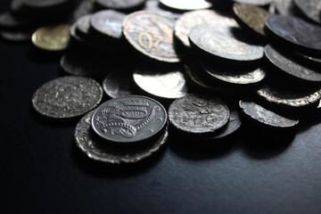 Close up of some banged up Australian coins