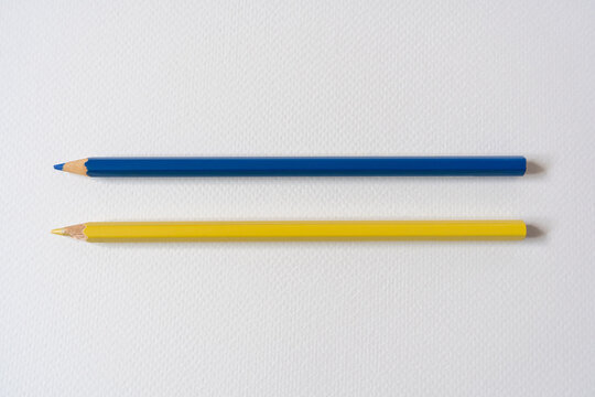 Blue and yellow colored pencils on paper
