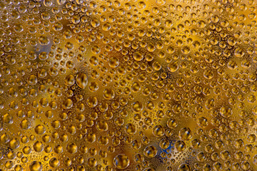 Abstract background of water droplets on the glass surface