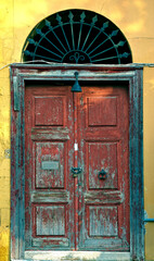 Fototapeta na wymiar An old rustic door. A rustic door.