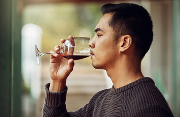 Now this is a good wine. Shot of a young man out wine tasting.