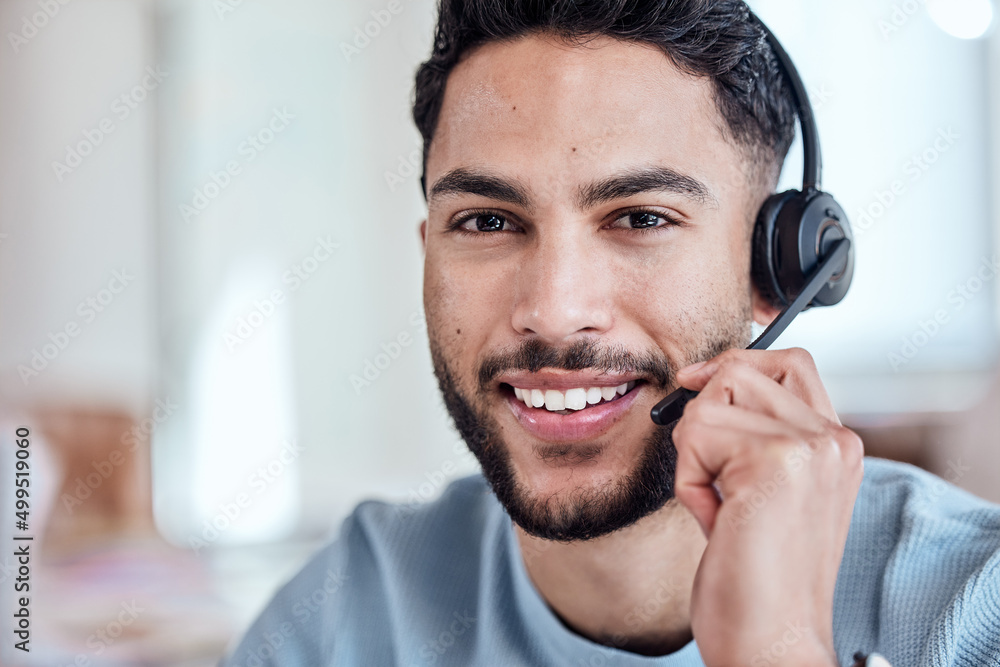 Poster this is where we make dreams come true. shot of a handsome young man working in a call center.