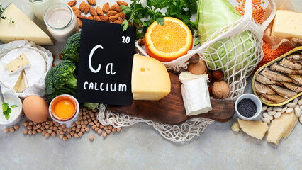 Healthy food high in calcium on light background.