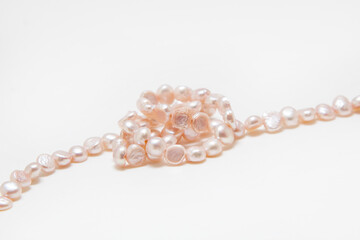 Pearl beads on a white background