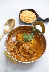 Dal Gosht or Daal Gosht is one of the very popular Mutton Recipes in India. Mutton cooked with spices and mixed lentils. Mutton dalcha with Tur dal and masoor dal. Copy space. Mutton curry in Kadai.
