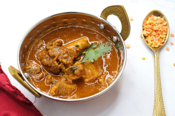 Dal Gosht or Daal Gosht is one of the very popular Mutton Recipes in India. Mutton cooked with spices and mixed lentils. Mutton dalcha with Tur dal and masoor dal. Copy space. Mutton curry in Kadai.
