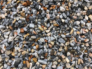 Pebble gravel stone floor background texture.