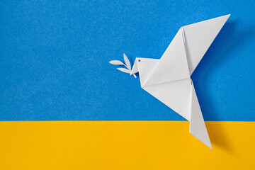 The dove of peace and the flag of Ukraine as a symbol of no war and conflict. Patriotism and...