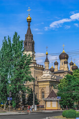 Mykolaiv, Ukraine - July 26, 2020: View of the Cathedral of Our Lady Mother of Kasperovskaya from Sadova street in Mykolaiv, vertical. Beautiful architecture of the Ukrainian Orthodox Church