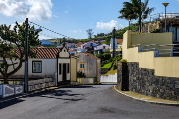 Fototapeta na wymiar The street with undefined houses in Azores