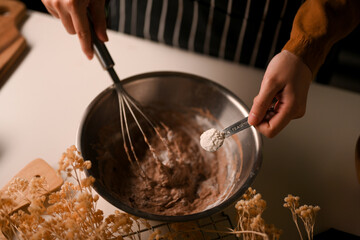 Female prepare homemade sweet chocolate cookies dough