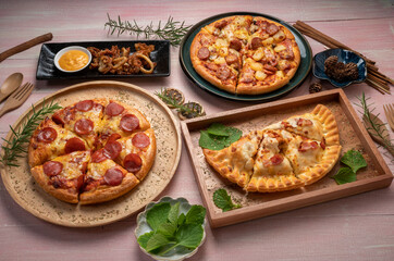 Tasty pepperoni pizza and  Mushroom and Sausage Pizza on wooden background. Top view of hot pepperoni pizza.