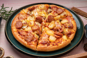 Top view of hot Mushroom and Sausage Pizza on wooden background.