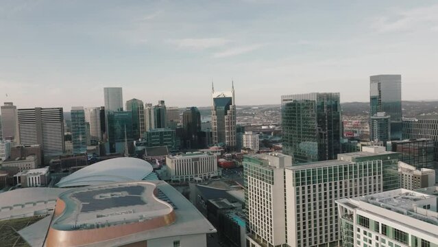 Slow aerial pull out shot of batman building in downtown Nashville, TN.