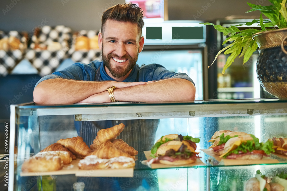 Poster I only serve the freshest at my store. Portrait of a proud business owner working in his store.