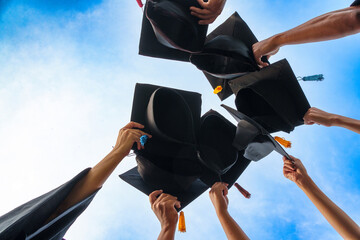 Graduation Caps Thrown in the Air success graduates of the university,Concept education...