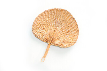 rattan hand fan with white background