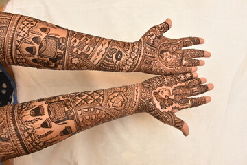 Bridal henna tattoo on hands. Indian Wedding Mehendi 