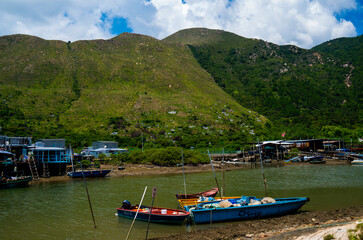 Fototapeta na wymiar Boats moored at the coastline of Tai O