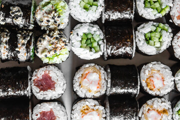 Set of sushi and maki on white background. Flat lay, top view