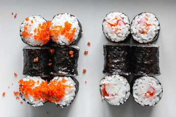 Set of sushi and maki roll on dark background .Top view