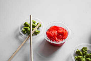 Set of sushi and maki on white background. Flat lay, top view