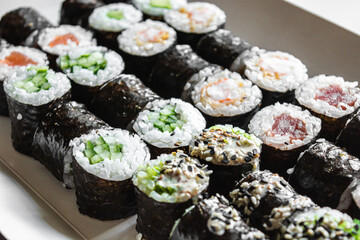 Sushi and rolls. Delicious set of fast food delivery on a white background