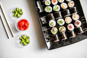 Sushi and rolls. Delicious set of fast food delivery on a white background