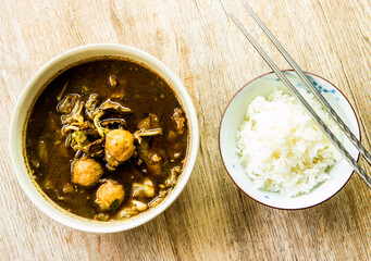 Chinese soup with meatball and rice, in studio Chiangmai Thailand