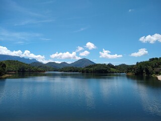 Neyyar dam reservoir, Thiruvananthapuram, Kerala, blue sky background, landscape view