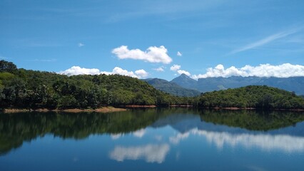 Fototapeta na wymiar Neyyar dam reservoir, Thiruvananthapuram, Kerala, blue sky background, landscape view