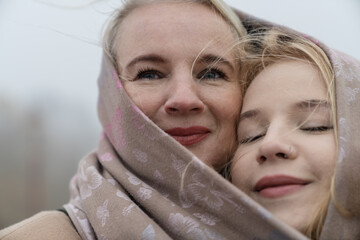 Happy mother and adult daughter