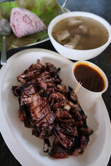 Sinalau Bakas translate to smoked wild boar, and the dish is simple as it sounds – slabs of marinated wild boar meat smoked on an open BBQ pit