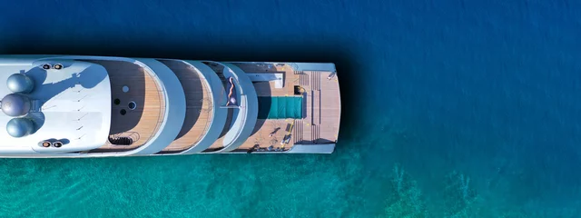 Foto op Plexiglas Aerial drone top view ultra wide photo of large yacht anchored in tropical exotic paradise with turquoise open sea © aerial-drone