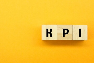 wooden cubes with the words Key Performance Indicators Or KPI