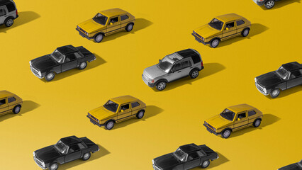 Toy cars pattern on yellow background. Minimal concept of car market crash