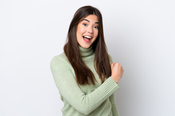 Young Brazilian woman isolated on white background celebrating a victory