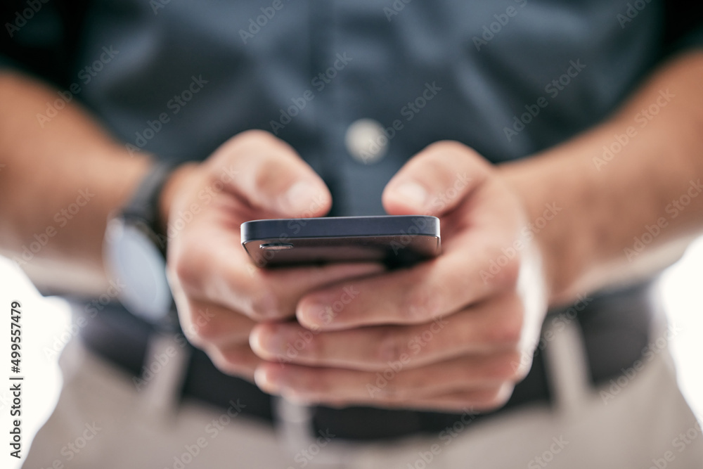 Aufkleber putting the pieces together. shot of an unrecognizable businessman using a smartphone in a modern of