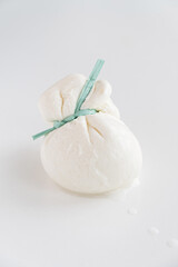 burrata is a fresh italian cheese made from mozzarella and cream