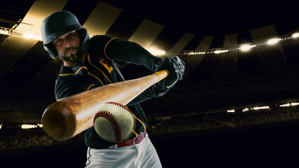 Poster with professional baseball player with baseball bat in action during match in crowed sport stadium at evening time. Sport, win, winner, competition concepts. © master1305
