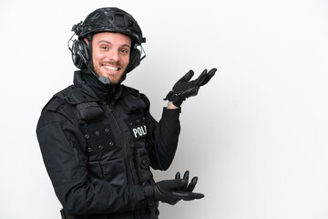 Fototapeta premium Brazilian soldier man isolated on white background extending hands to the side for inviting to come
