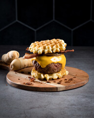 Waffle burger with cheese, bacon and some tequeños 