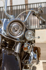 close-up shot of the front of a custom motorcycle with selective focus