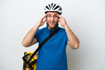 Young caucasian man with thermal backpack isolated on white background with surprise expression