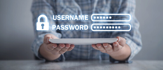 Human hand showing Username and Password with padlock.