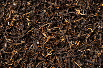 Dian Hong, black tea on white background. Top view. Close up. High resolution