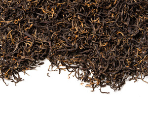 Dian Hong, black tea on white background. Close up. High resolution.