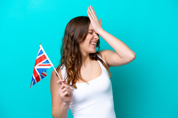 Young caucasian woman holding English flag isolated on blue background has realized something and intending the solution