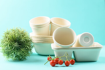 Biodegradable coffee cup and bowl made from natural fiber on color background, Eco friendly and sustainability concept