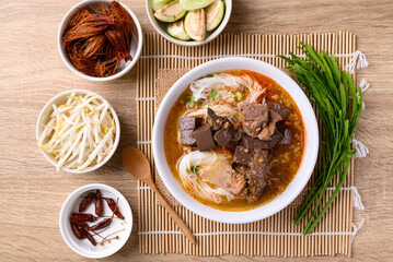Northern Thai food, Spicy rice noodles soup with pork eating with fresh vegetables, Local Thai food